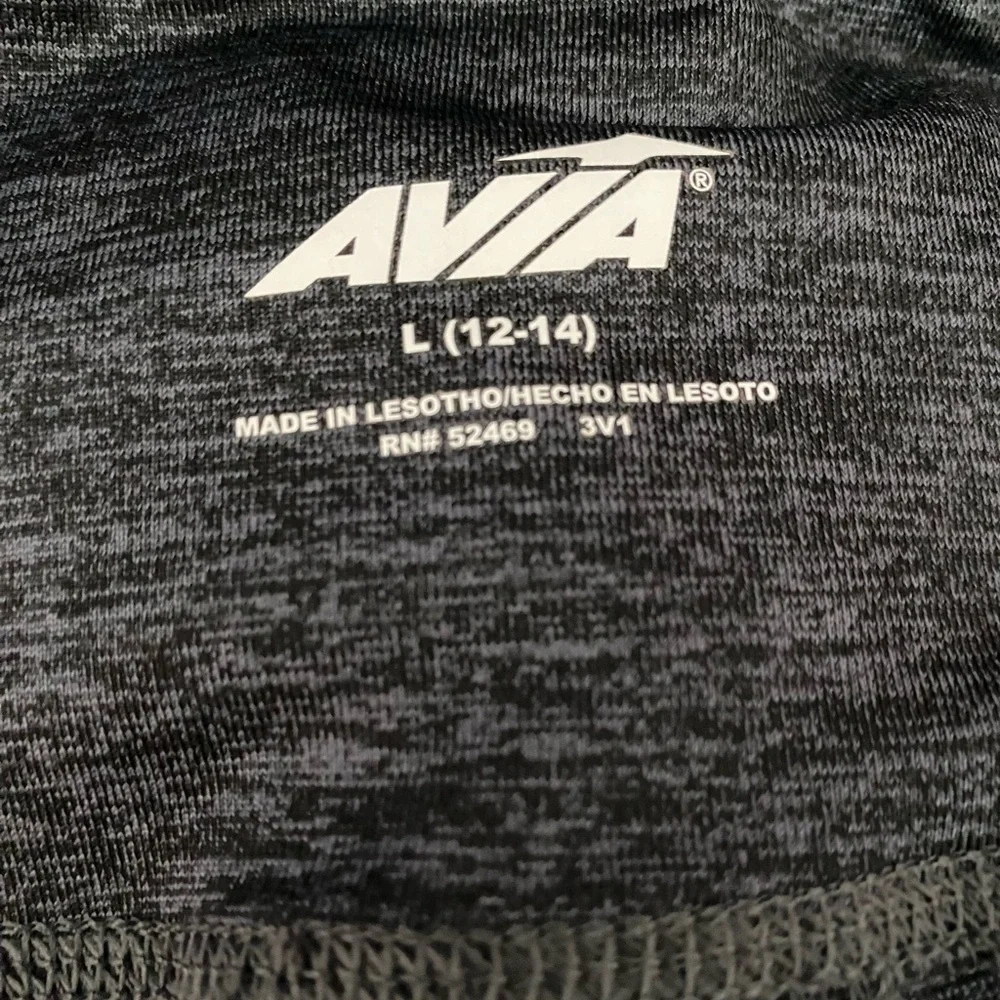 Avia grey leggings with leg pockets. Size Large. Made with recycled polyester